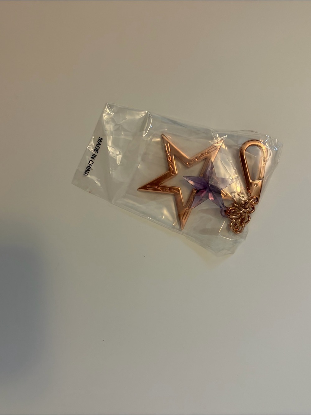 NWOT MAC keychain with Purple Star Accent